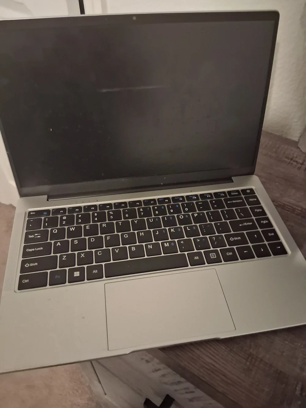 Silver Laptop with Black Keyboard - Portable Laptop Computer